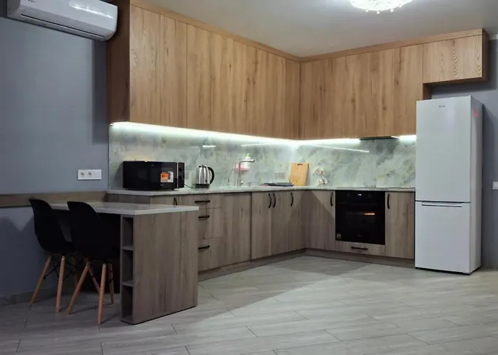 простора сімейна оселя поруч з ратушею & бічна з площею ринок кухня-студія та спальня Apartmán *